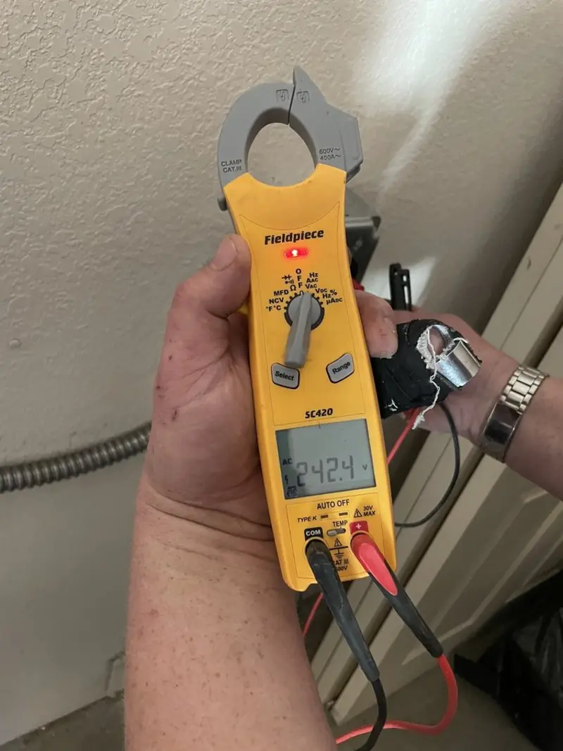 Voltage testing with clamp meter during Hot Tub / Pool Electrical Wiring in White Hall